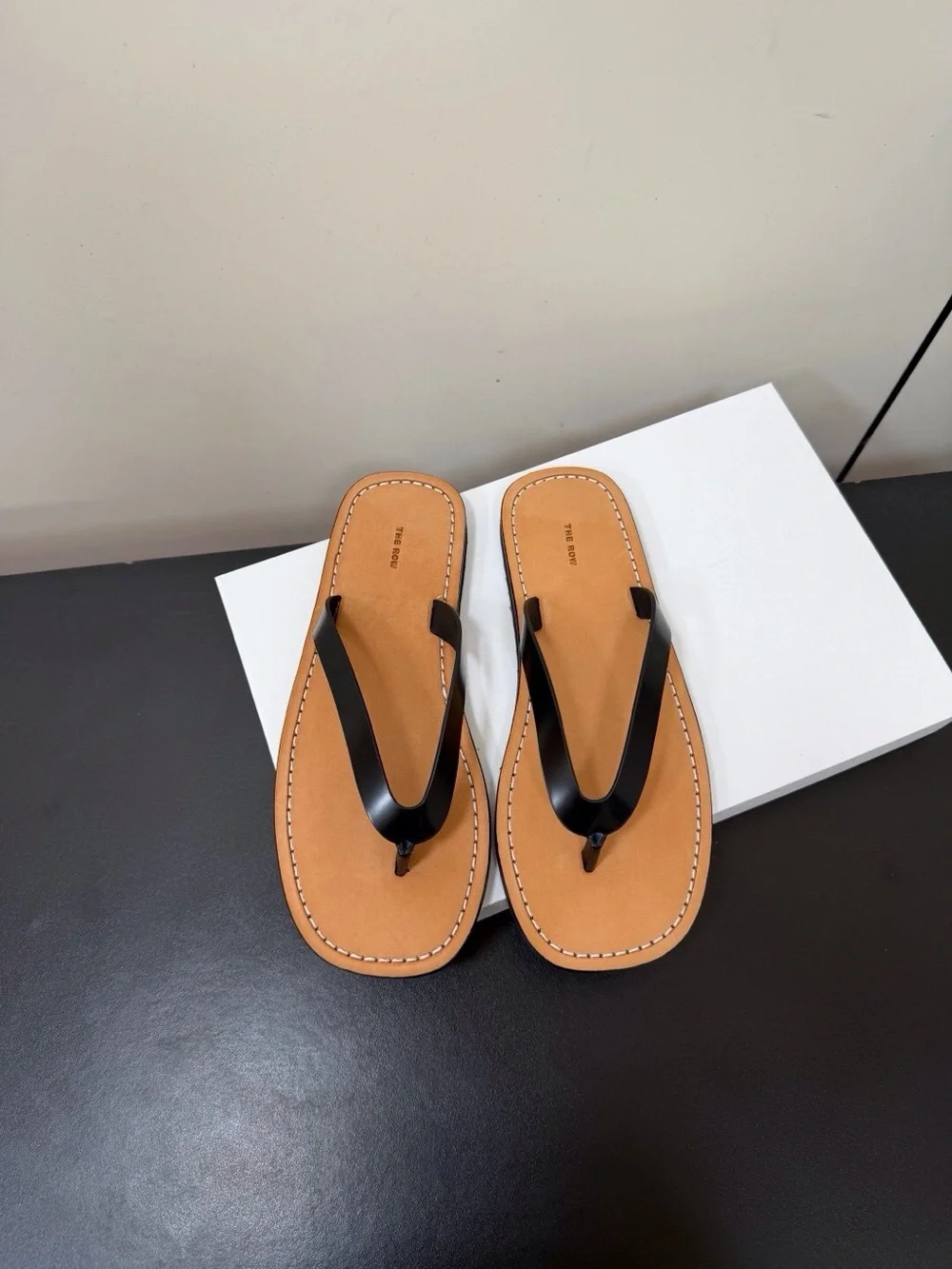 Women’s Tan Leather Flip-Flop Sandals with Black Straps